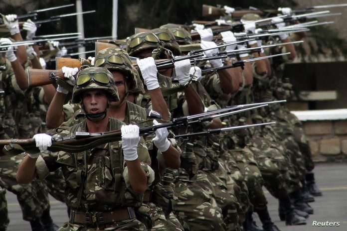 Trainees army officers from the 40th class march during their graduation ceremony at a Military Academy in Cherchell